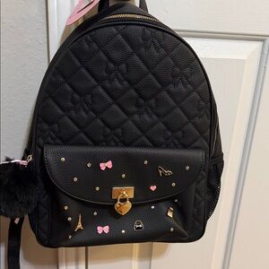 Chic Black Quilted Backpack with Pink Accents